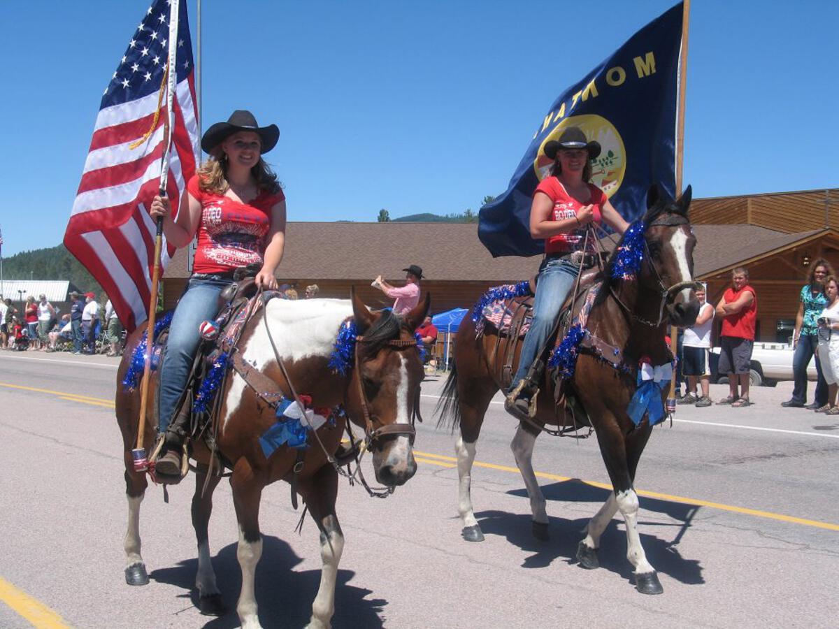 Kelly and Shannon Rich Carrying the Colors at the Fourth of July Parade in Seeley Lake